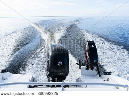 Sankt-petersburg, Russia, August 8, 2020:  Modern New Fishing Sport Boat With A Brand New Mercury Fo