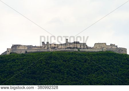 View Of Castel Beseno, Medieval Castle Along The Adige Valley, In Trento Province, Italy, Seen From 