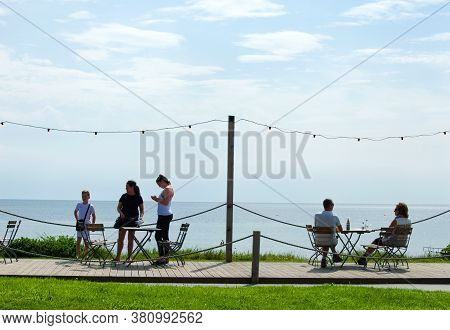 Criccieth / Wales / August 15 2020 : The Charming Welsh Seaside Resort Of Criccieth.  Holiday Makers