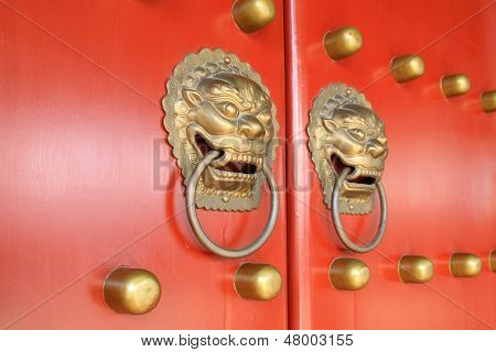 Metal Knocker On The Door In The Forbidden City In Beijing, China