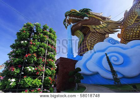 Golden Dragon Statue With Blue Sky