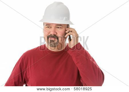 Bored Looking Workman Chatting On His Mobile