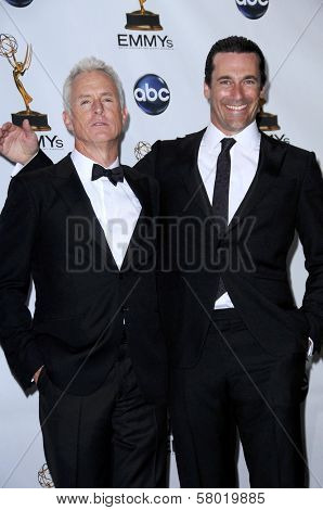 John Slattery and Jon Hamm  in the press room at the 60th Annual Primetime Emmy Awards. Nokia Theater, Los Angeles, CA. 09-21-08
