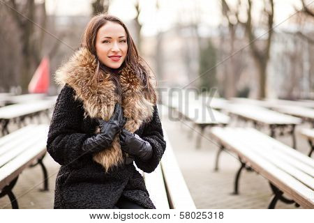 Young lady smiling in the park