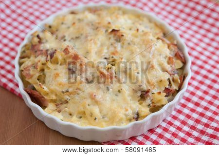 Creamy baked pasta with bacon and cheese