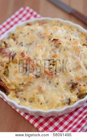 Creamy baked pasta with bacon and cheese