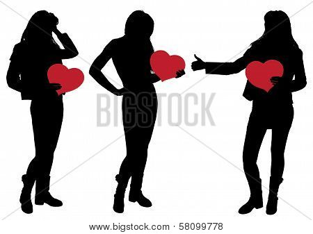 Silhouette Of A Girl Holding A Heart