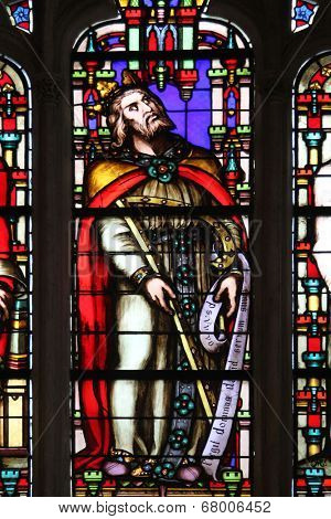 PARIS, FRANCE - NOV 11, 2012: King David, stained glass from Church of St-Germain-l'Auxerr ois founded in the 7th century, was rebuilt many times over several centuries. 