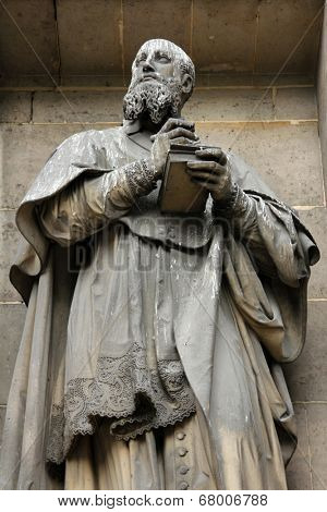 PARIS, FRANCE - NOV 09, 2012: Saint Francis de Sales, architectural details of Eglise de la Madeleine. Madeleine Church was designed in its present form as a temple to the glory of Napoleon's army.