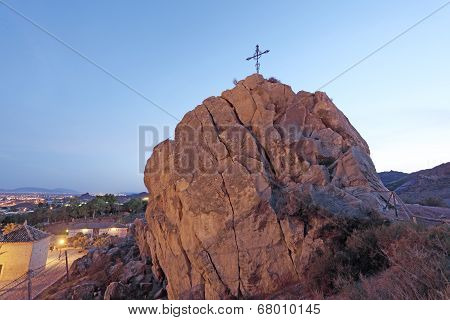 Christian Cross On Top Of A Rock