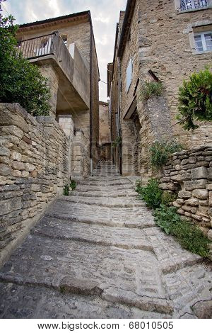 Narrow Street In Medieval Town Gordes, Southern France