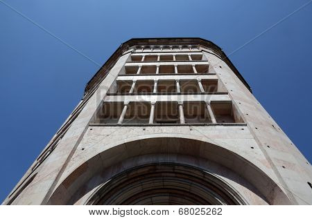 PARMA, ITALY - MAY 01, 2014: Baptistery on Piazza del Duomo in Parma from Benedetto Antelami. Baptistery in Parma is considered to be among the most important Medieval monuments in Europe.