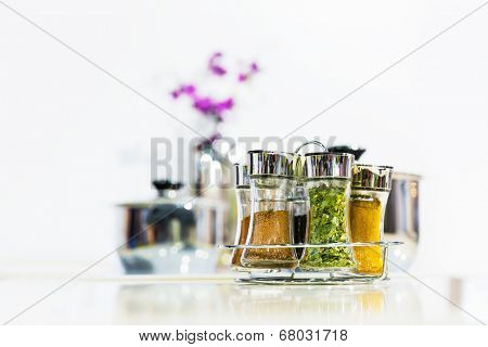 Powder spices in glass bottle jar