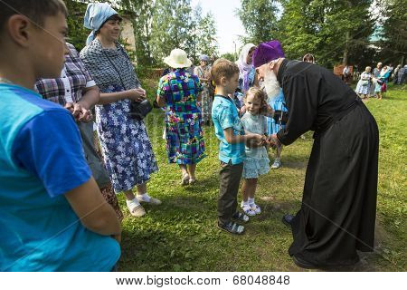 KRASNY BRONEVIK, RUSSIA - JULY 7, 2014: Celebrations commemorating the Rev. Anthony Dymsky (died 1224) in Antony Dymsky Monastery - Procession on Lake Dymsky, the great blessing of water and bathing.