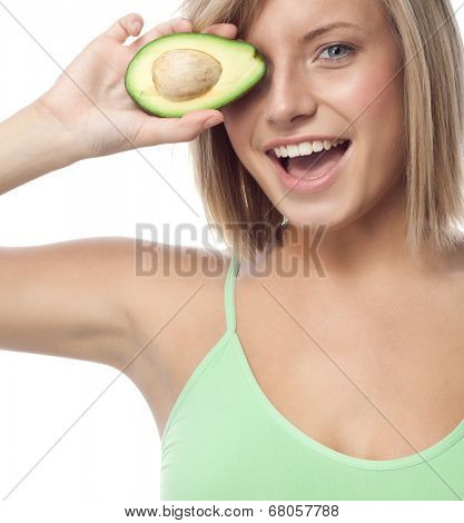 portrait of attractive  caucasian smiling woman isolated on white studio shot eating avocado