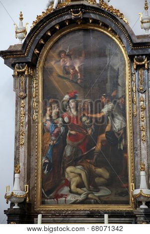 WURZBURG, GERMANY - JULY 18, 2013: The Beheading of St John the Baptist, Neumunster Collegiate Church, built in 1060 and completely renovated in the 17th century and since 1908 the parish church 