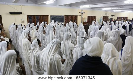 KOLKATA, INDIA - FEBRUARY 15: Sisters of The Missionaries of Charity of Mother Teresa at Mass in the chapel of the Mother House, Kolkata, India at February 15, 2014.