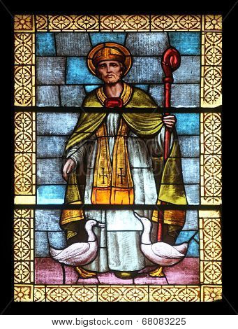 PORT AZZURRO, ELBA, ITALY - MAY 03: Saint Martin, stained glass in the church of St. James the Greater. The church is located inside the fort of the same name in Porto Azzurro, Italy on May 3, 2014