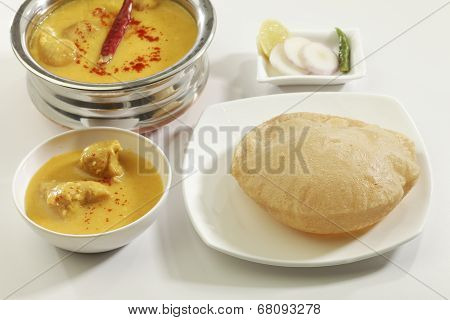 Indian Food: Kadhi with gatte and deep fried puri.