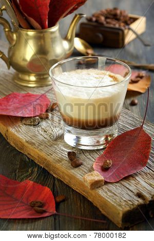 Coffee Cortado And Autumn Leaves.