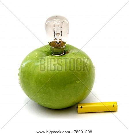 Green Apple With A Lamp And A Battery