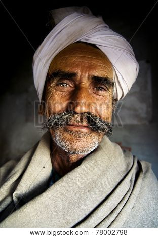 Indigenous senior Indian man looking at the camera.