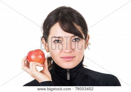 closeup portratit beautiful young girl holding a red apple