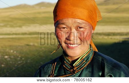 Beautiful young Mongolian lady in the late afternoon sun.