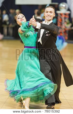 Minsk-belarus, October 5, 2014: Professional Dance Couple Of Alexey Tkachuk And Nadezhda Volui Perfo