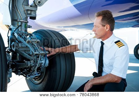 Checking The Wheels.