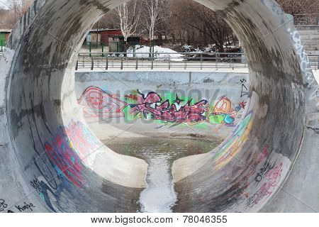 Perm, Russia - April 25, 2014: Round Ramp And Graffiti In Playground For Skateboarders