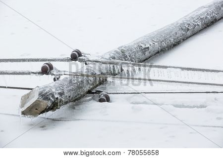 Fallen Pylon Covered With Sleet And Ice