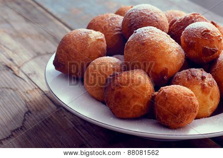 Sweet Fried Doughnuts Sprinkled With Sugar Powder