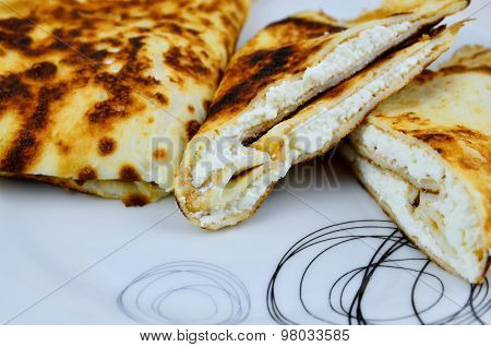 Pancakes with white cheese