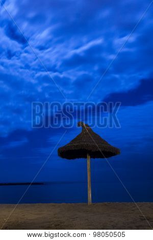 palm parasol on moonlight beach