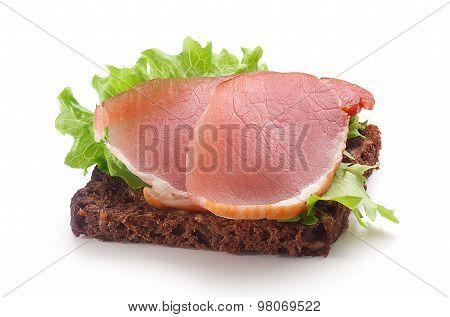 Sandwich With Pork Balyk, Rye Bread And Lettuce