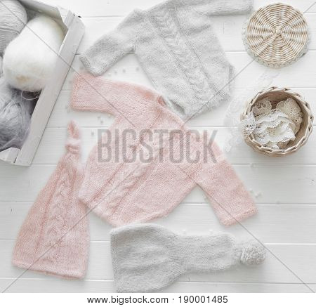 Lovely pink and gray pastel clothes for infant, handmade, hat and sweater, body, topview