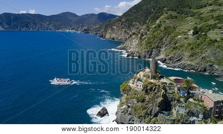 Aerial footage with drone on Vernazza, one of the famous Cinqueterre country, small village with colored houses on the cliff over the sea