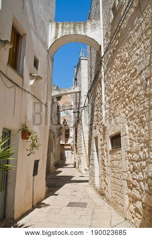 Characteristic alleyway of Cisternino. Puglia. Southern Italy.