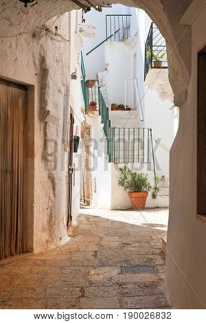 Characteristic alleyway of Cisternino. Puglia. Southern Italy.