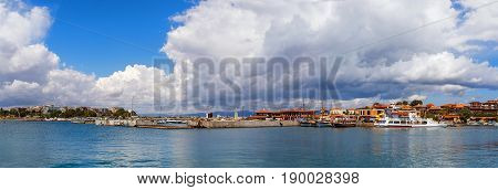Nesebar Bulgaria - September 06 2014: Ships boats and yachts in the port of the old town Nessebar on the Bulgarian Black Sea Coast. Panoramic shot.