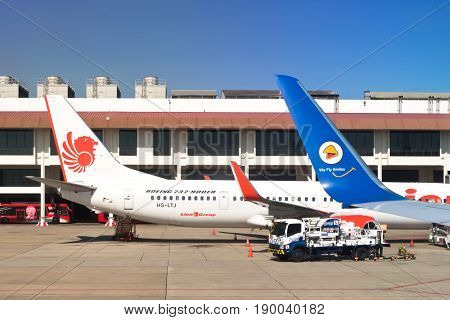 BANGKOK THAILAND-NOVEMBER 26: Nok Air and Lion Air are low cost airline plane park at Don Mueang International Airport on November 26 2016 in BangkokThailand.