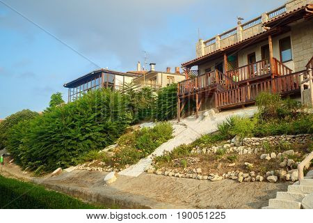 Nesebar Bulgaria - September 05 2014: Seaside resort and ancient old town Nesebar in Bulgaria. Architecture and shrubs. Bulgarian Black Sea Coast. UNESCO world heritage site.