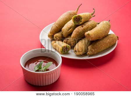 Stuffed Chilli Pakora or mirchi pakoda or mirchi vada, An extremely delicious and mouth watering snack of Pakistani & Indian People