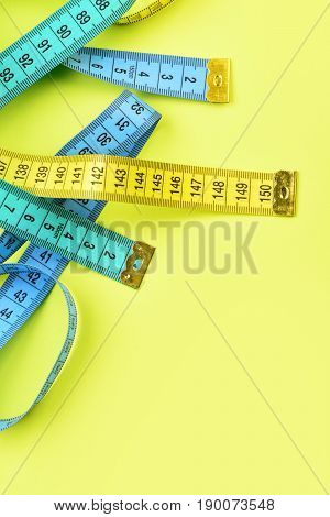 Measure Tapes In Lemon, Turquoise And Blue Colours