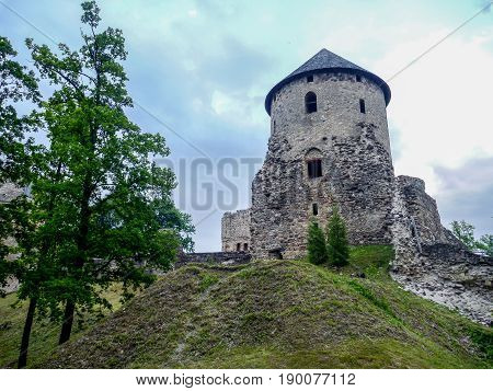 Watchtower and surrounding wall of castle ruins in Cesis town, Latvia