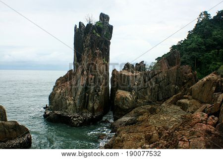 beach with clifs, thailand sea and blue sky