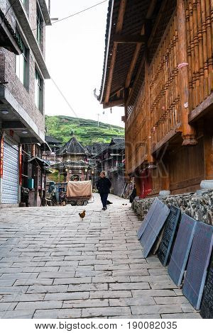 Old Woman On Alley In Chengyang Village