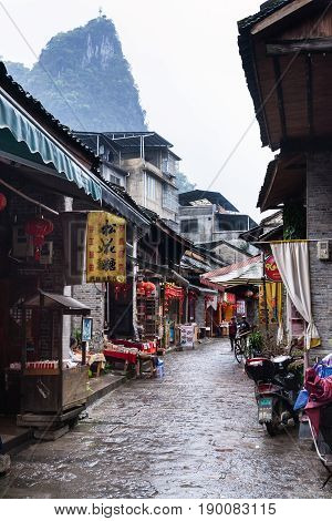 Visitors On Market Street In Xingping Town