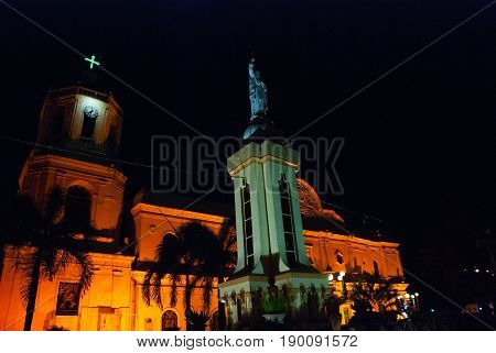 The Catholic Cathedral And The Monument To The Night In Cebu. Philippines